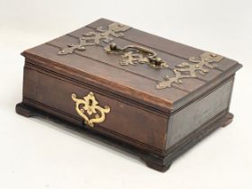 A Victorian pine brass bound jewellery box. 26x21x10.5cm