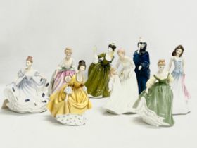 A collection of 8 Royal Doulton figurines. 22cm.