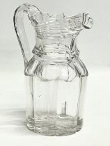 A large Victorian glass jug. 17x23cm