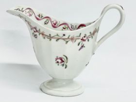 A late 18th century New Hall ‘Pink Ribbons’ porcelain cream jug. Circa 1790. 13x6x10cm