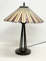 A large Tiffany style table lamp.