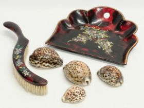 A Victorian lacquered handed painted and Mother of Pearl crumb tray and brush with 4 shells.