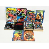A collection of Marvel and DC graphic novels.