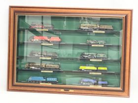 Large framed model trains. 85x60cm