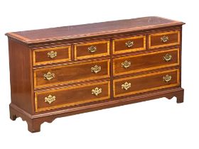 A large good quality George III style multi drawer chest of bracket feet. 170x48x82cm