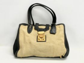 A ladies Miu Miu handbag. 40x30cm