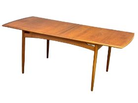 A G-Plan Mid Century teak extending dining table. 1960’s. Open 89x192x73cm. Closed 89x146.5x73cm