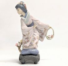 A Lladro porcelain 'Michiko' figure. 1447. 22cm
