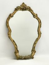 A vintage ornate gilt framed mirror by Atsonea. 34x53cm.