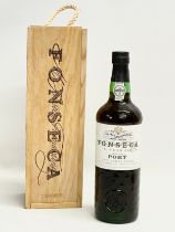 A bottle of Fonseca port with crate. 10 Year Old. Matured in Wood. 70cl.