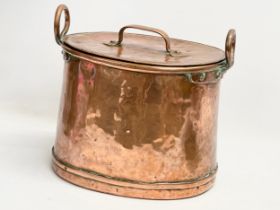 A large Victorian copper 2 handled pot with lid. 34x24x30cm