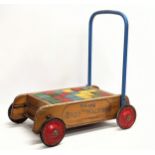 A vintage Tri-ang Baby Walker