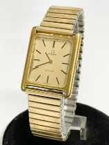 A vintage Omega De Ville watch.