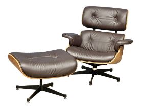 A good quality Charles & Ray Eames style leather and faux rosewood swivel armchair and ottoman.