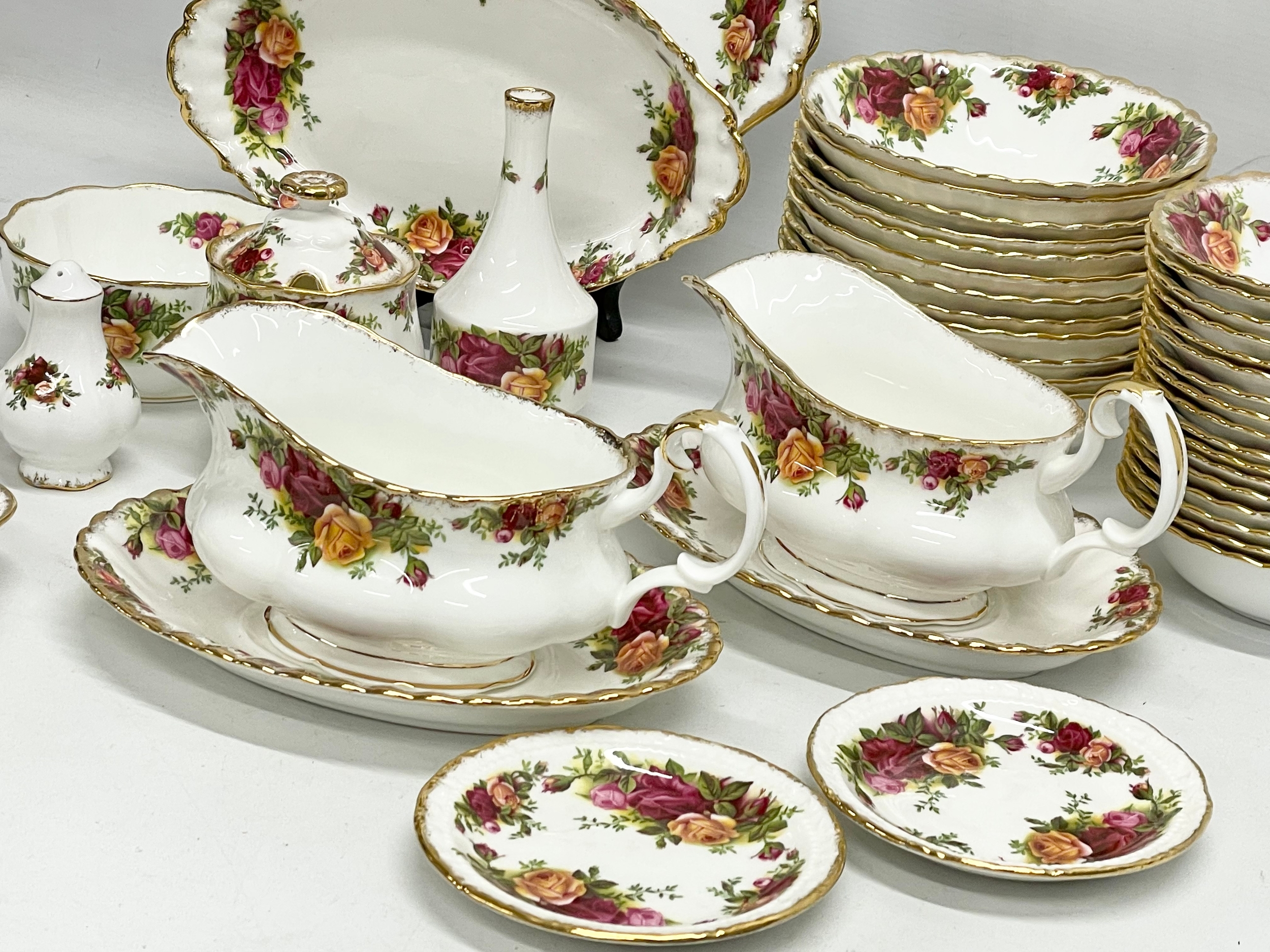 43 pieces of Royal Albert ‘Old Country Roses’ tea and dinner ware. A pair of gravy boats with - Image 4 of 8