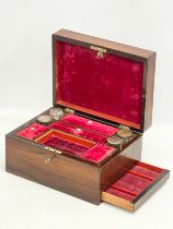 A Victorian rosewood vanity box with Mother of Pearl. 30x23x17cm