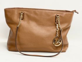 A Michael Kors leather handbag. 40x26cm
