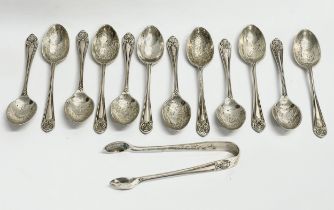 A set of early 20th century silver spoons and tongs by Walker & Hall. Sheffield, 1921. 167 grams.