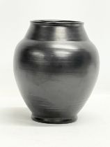 A 1930’s Pilkington's Royal Lancastrian black glazed vase. 20x23cm