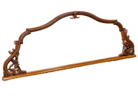 A large Victorian mahogany overmantle mirror. 224x83cm