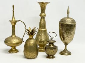 A collection of early to late 20th century Indian brass. Largest vase 35cm