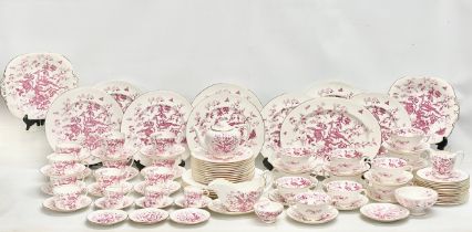 A 103 piece Coalport pink and white ‘Cairo’ porcelain tea, coffee and dinner service. Circa 1926-