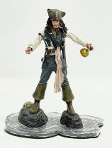 A Neca 2006 Disney ‘Captain Jack Sparrow’ figure. 17x20cm