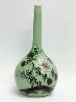 A 19th century Chinese Celadon bud vase. 15.5cm