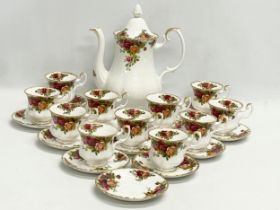 A 24 piece Royal Albert ‘Old Country Roses’ coffee set. 11 coffee cups, 12 saucer and a coffee pot.
