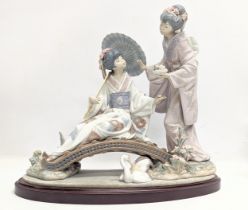 A large Lladro porcelain 'Springtime In Japan.' J-10K. On stand. 37x33cm
