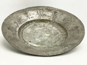 A 19th century Middle Eastern pewter bowl. 27x4cm