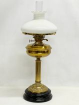 A large Victorian style brass double burner oil lamp. 69cm
