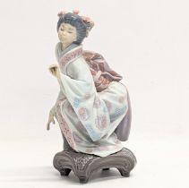 A Lladro porcelain 'Yuki' figurine. 1448. 20cm