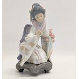 A Lladro porcelain 'Kyioko' figurine. 1450. 18.5cm