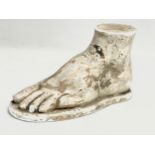 A late 19th/early 20th century plaster foot. 25x13cm