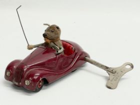A rare vintage Schuco Sonny 2005 windup mouse in car. Made in US Zone Germany. 14cm