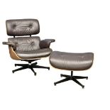 A good quality Charles & Ray Eames style leather and faux rosewood swivel armchair and ottoman.