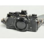A vintage Olympus OM-2n camera.