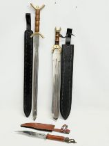 2 replica Celtic swords and a dagger. Swords 78cm. 64cm. Dagger 35cm