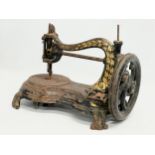 A late 19th century sewing machine. 34cm