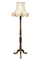 A large good quality early 20th century Chippendale Revival mahogany standard lamp on cabriole legs.