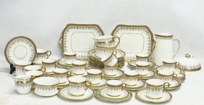 A good quality 72 piece early 20th century Cauldon LTD gilt porcelain tea service.