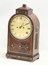 A large Regency mahogany brass inlaid double fusee mantle clock with pendulum. 27x16x50cm