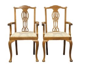 A pair of early 20th century Chippendale Revival armchairs.
