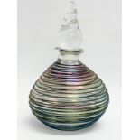 A vintage Iridescent Art Glass perfume bottle. 14cm