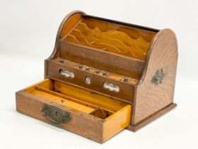 A late Victorian oak desktop stationary box with tambour roll top. 31x22x23cm