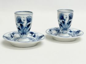 A pair of late 19th century Fischer & Mieg, Pirkenhammer porcelain candleholders/egg cups. 10x8cm