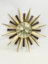 A 1960’s Mid Century ‘Sunburst’ wall clock. By Metamec. 60cm