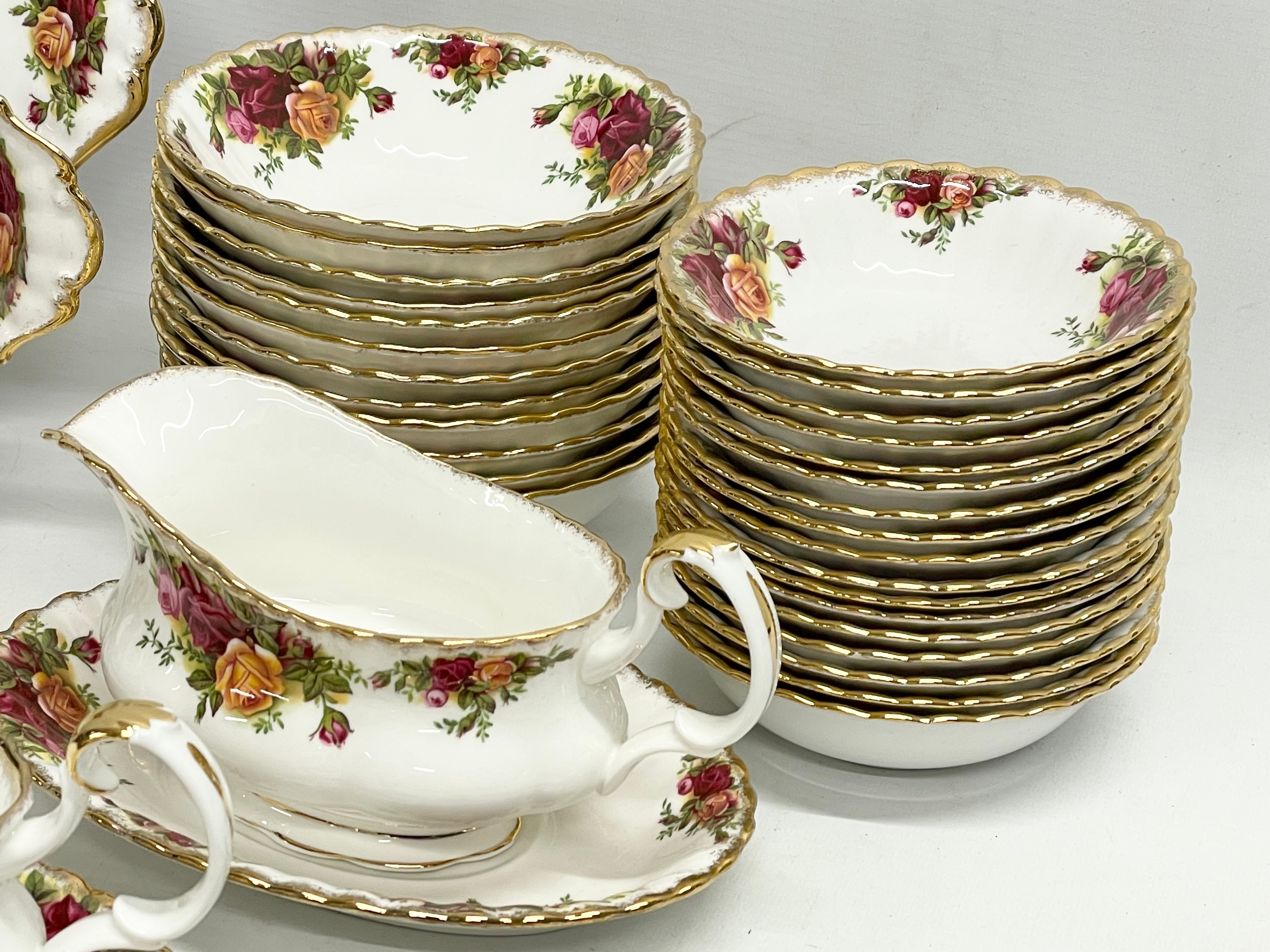 43 pieces of Royal Albert ‘Old Country Roses’ tea and dinner ware. A pair of gravy boats with - Image 7 of 8