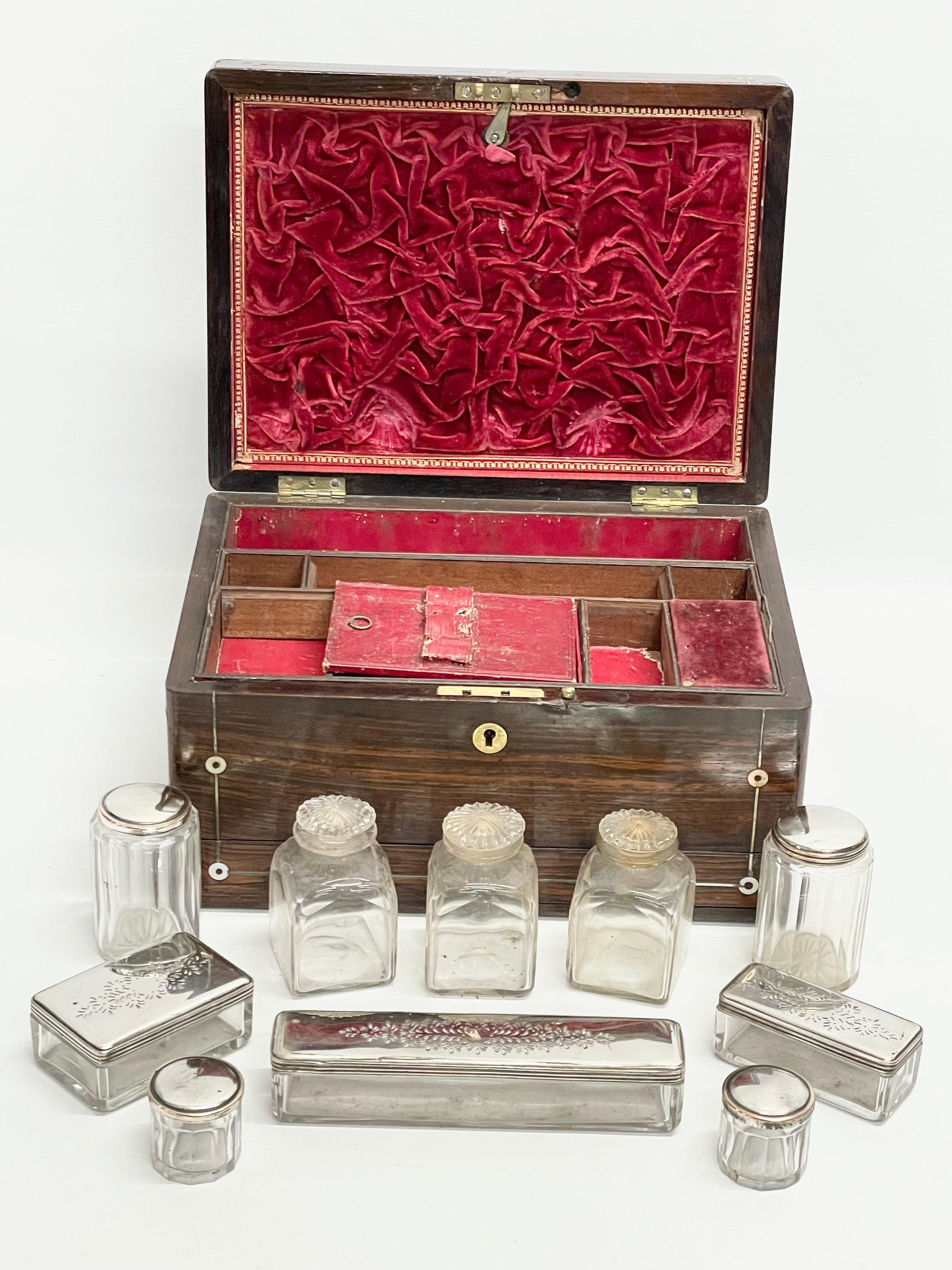 A Victorian rosewood vanity box with Mother of Pearl inlay and cut glass bottles with silver - Image 10 of 11